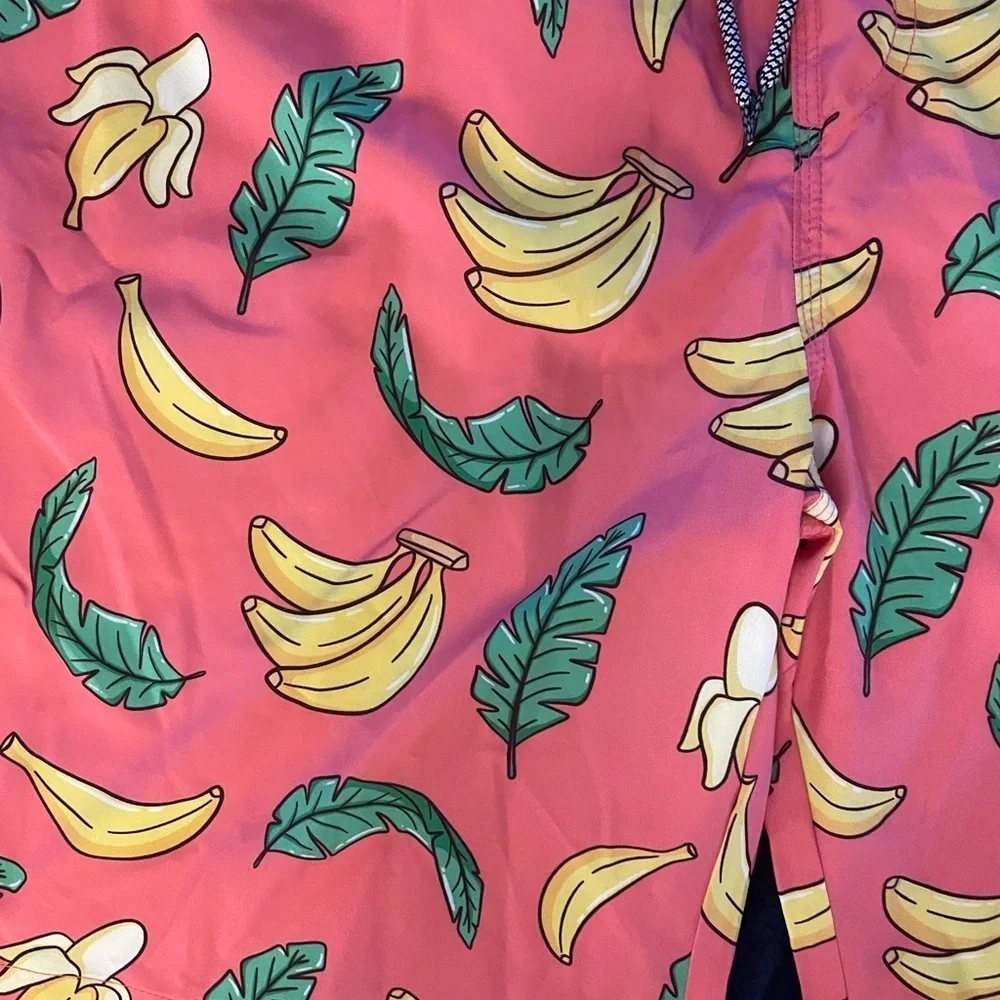 New XXL Men’s Board Shorts Banana pattern.  Built in mash, brief Quick drying